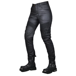 Women's black coated motorcycle pants with protective stretch panels and riding boots