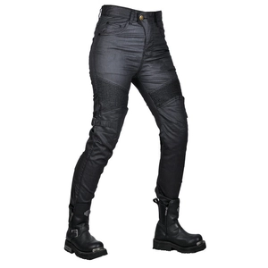 Detail of knee accordion pleats and metal side buckles on black coated biker trousers
