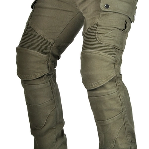 Detail of army green motorcycle jeans with reinforced knee protectors and accordion panels