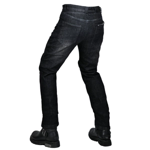 Detail view of motorcycle jeans with accordion stretch panels and reinforced stitching