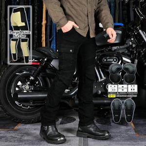 Detail of Kevlar protective lining and CE certified knee pads on black biker jeans