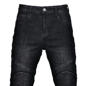 Detail view of charcoal black motorcycle jeans with pleated knee panels and metal button