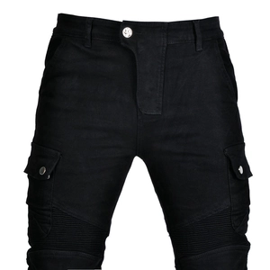 Detail of black biker jeans showing cargo side pockets and accordion knee pleats