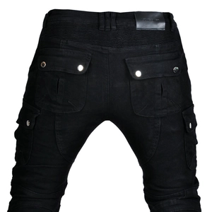 Detail of motorcycle biker pants showing accordion stretch panels and rear pockets