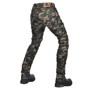 Detail of camo motorcycle riding pants showing durable fabric and leather waist label