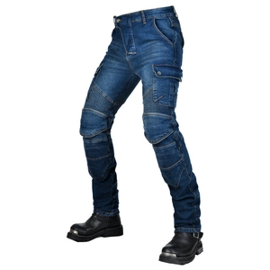 Detail of blue biker jeans featuring reinforced knee pads and elastic flex panels