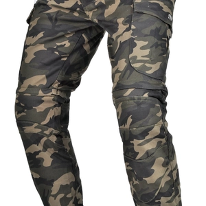 Detail of cargo motorcycle pants featuring jungle camo pattern and knee pleats