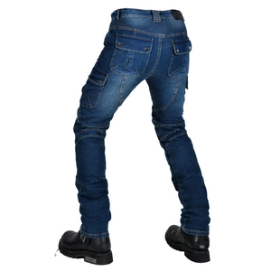 Detail of blue biker jeans featuring accordion stretch panels and tactical cargo pockets