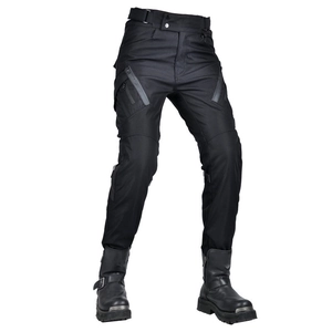 Detail of waterproof motorcycle riding pants with reinforced knees and large cargo pockets