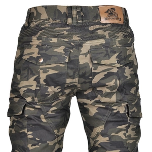 Detail of motorcycle riding pants showing camo fabric and elastic accordion panels