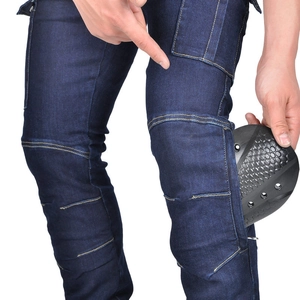 Detail of motorcycle jeans showing side zipper for knee armor pad insertion
