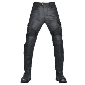 Coated vintage motorcycle jeans with knee pleats and multi-pocket cargo design