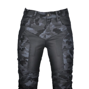 Close-up of camo motorcycle pants featuring mesh panels and accordion stretch knees