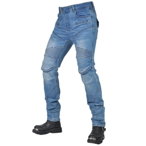 Detail of blue motorcycle jeans featuring flexible accordion panels and knee protector pockets