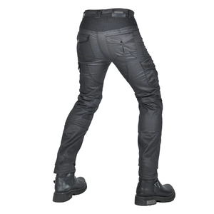 Detail view of motorcycle cargo pants with stretch pleats and durable pockets