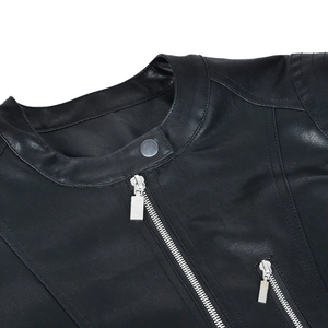 Detail of female motorcycle jacket collar with silver zipper and metallic snap button