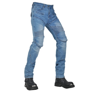Detail of light blue motorcycle jeans featuring flexible accordion panels and knee protection