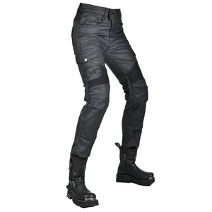 Detail of cargo motorcycle pants featuring protective knee pads and tactical side pockets