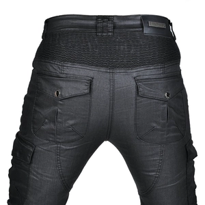 Rear view detail of black motorcycle pants with elastic waist panels and cargo pockets