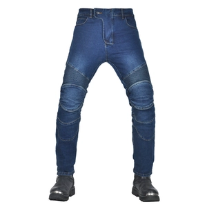 Detail of blue motorcycle denim pants with pleated knee panels for flexible riding movement
