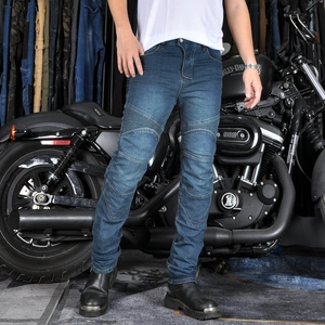 Detail of stretch accordion panels on knees of motorcycle riding jeans with boots