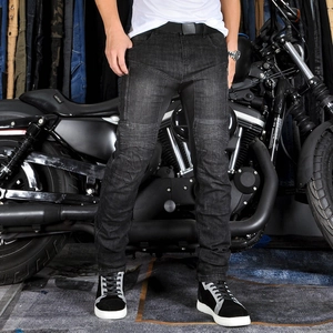 Men's motorcycle jeans with protective mesh panels and stretch accordion knees on a bike