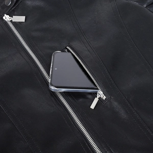 Detail of motorcycle leather jacket showing silver zippers and deep smartphone pocket