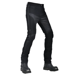 Detail of breathable mesh panels and protective knee padding on black motorcycle jeans