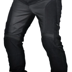 Detail of breathable mesh panels and reinforced knee protection on black motorcycle jeans