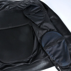Detail view of motorcycle jacket interior with mesh lining and armor protector pockets