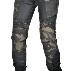 Detail of camouflage motorcycle pants featuring breathable mesh and flexible pleated knees