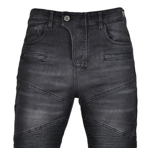 Detail of charcoal grey biker jeans featuring pleated knee panels and slim fit design