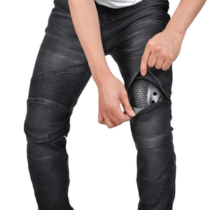Detail of motorcycle jeans showing the built-in honeycomb knee pads and flexible pleats