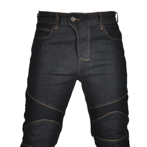 Detail of dark blue motorcycle jeans with horizontal quilted knee pads and orange stitching