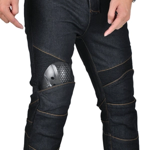 Protective motorcycle riding jeans in dark blue denim with orange stitching and CE knee pads