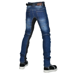 Detail view of motorcycle jeans with protective elastic panels and reinforced denim fabric