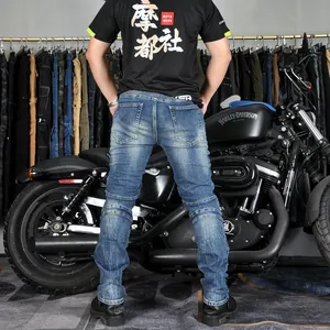 Rear view of motorcycling jeans with accordion stretch panels on a gray blue denim fabric