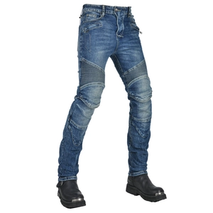 Detail of accordion stretch panels on blue motorcycle jeans for flexible knee movement