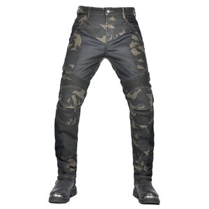 Close-up of camouflage motorcycle jeans with accordion stretch panels at the knees