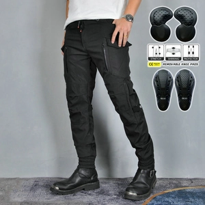 Detail of motorcycle cargo pants with removable honeycomb knee pads and shirring stretch panels