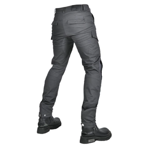 Macro detail of charcoal grey motorcycle cargo pants with tactical pockets and back flap