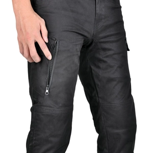 Detailed view of the breathable mesh lining and hidden zipper on motorcycle riding pants