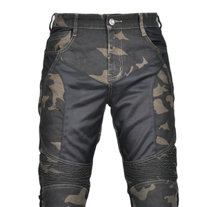 Detail of camouflage motorcycle pants featuring breathable mesh and accordion stretch knees