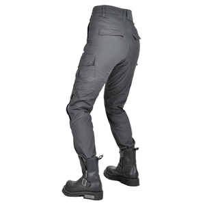 Women motorcycle riding pants with high waist, cargo pockets and heavy leather biker boots