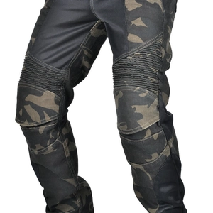 Detail of blue camo motorcycle jeans showing mesh fabric and knee armor protection