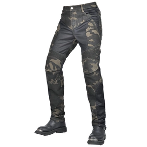 Detail of camo motorcycle pants featuring reinforced knee pleats and breathable mesh panels