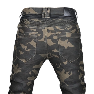 Detail of blue camo motorcycle jeans showing elastic stretch panels and leather waist patch