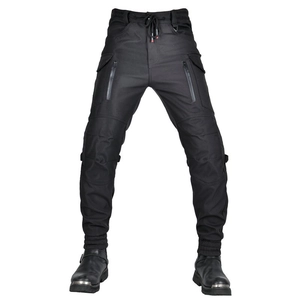 Detail of waterproof motorcycle pants with zippered pockets and elastic waist band