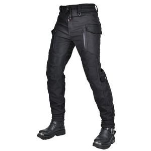 Detail of waterproof motorcycle pants featuring tactical cargo pockets and elastic high waist