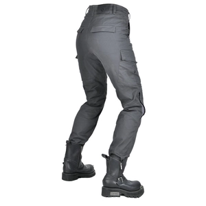 Detail of grey motorcycle cargo pants featuring functional pockets and side zipper accents